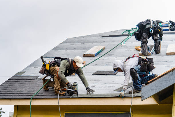 Professional Roofing technician working in Lexington, MA